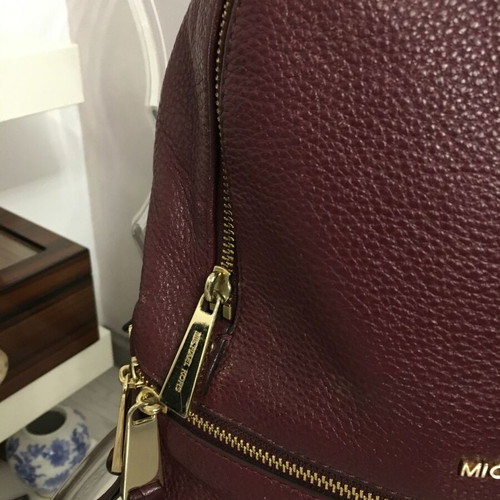 Michael Kors genuine leather backpack used, red