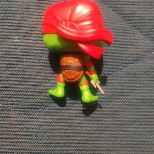 Teenage Mutant Ninja Turtle figure used in excellent condition