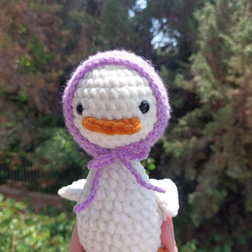 Handmade crocheted goose with hat made to order