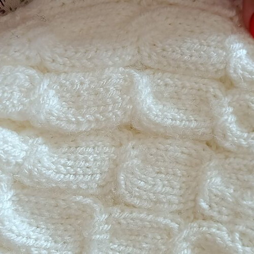 Children's knitted hat with pom pom, like new, white