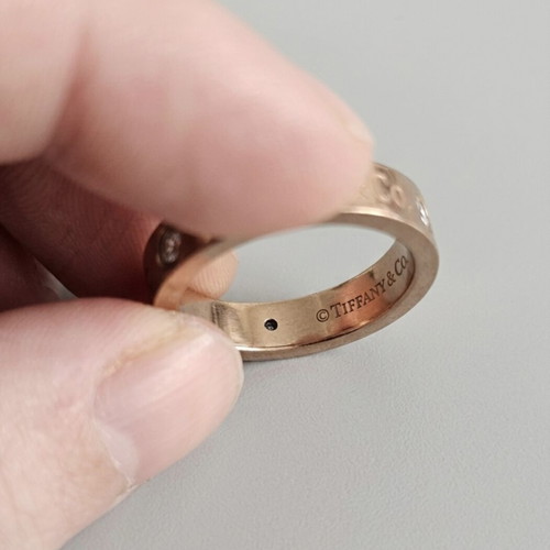 Ring used, rose gold plated with 3 zirconia stones