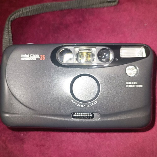 Mini Cam 35mm camera used with built-in flash