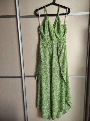 BSB jumpsuit lime green used, size small, lace detail