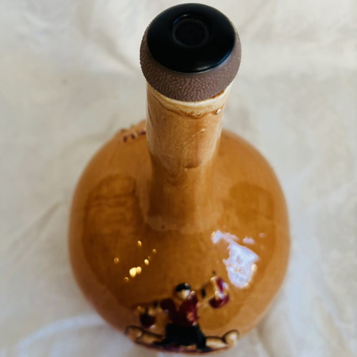 Vintage collectible 1965 glazed ceramic wine bottle used
