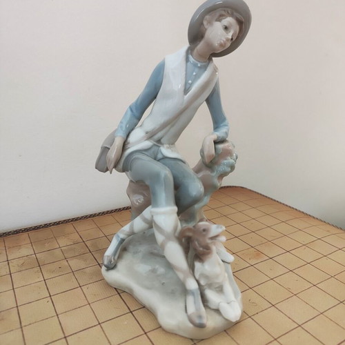 Lladró Boy with Dog porcelain figure refurbished