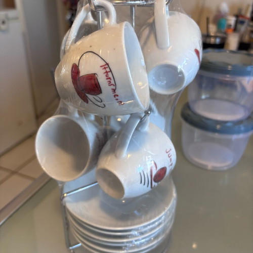 Set of 6 cups new with saucers and stand