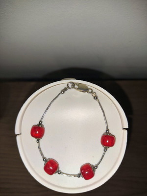 Handmade bracelet like new with red and silver glass beads