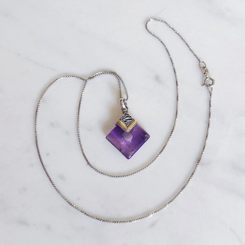 Vintage pendant with amethyst in 925 silver and gold