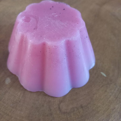Pink candle like new, flower shape, light rose scent