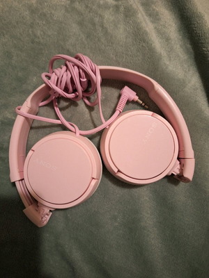 Sony pink headphones used, wired
