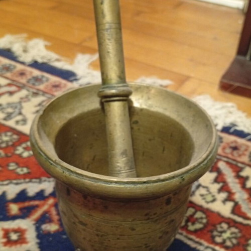 Traditional large brass mortar and pestle