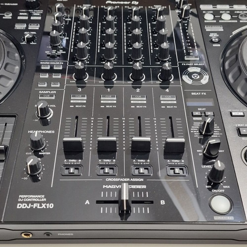 Pioneer DDJ-FLX10 DJ controller used with soft case and music collection