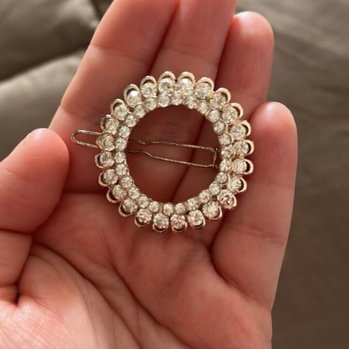 Hair accessory with stones in pink gold color like new