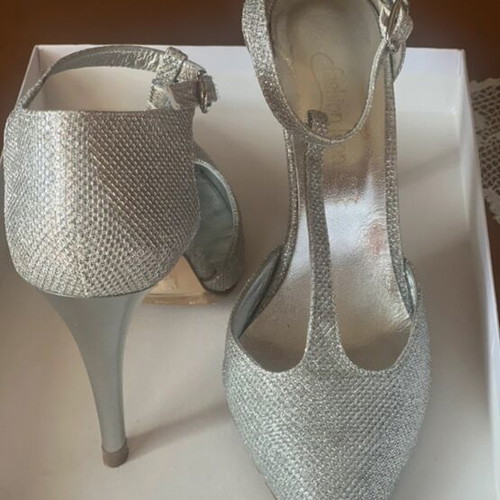Silver pumps like new with ankle strap and thin heel, size 37