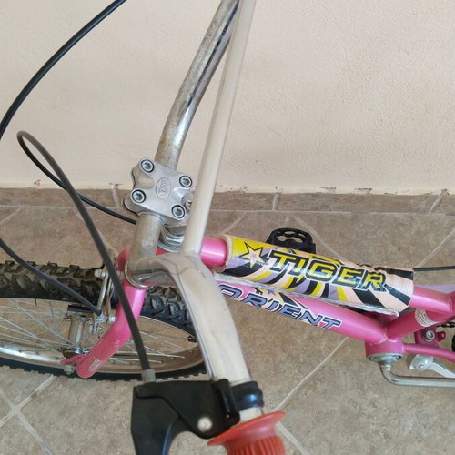 Girls BMX bike used with training wheels