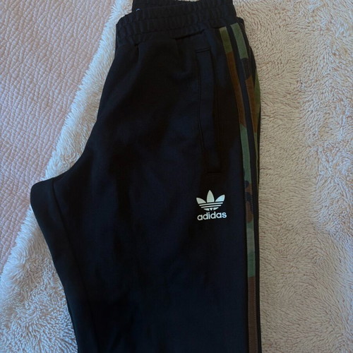 Adidas Originals women's black sweatpants with camouflage stripes like new