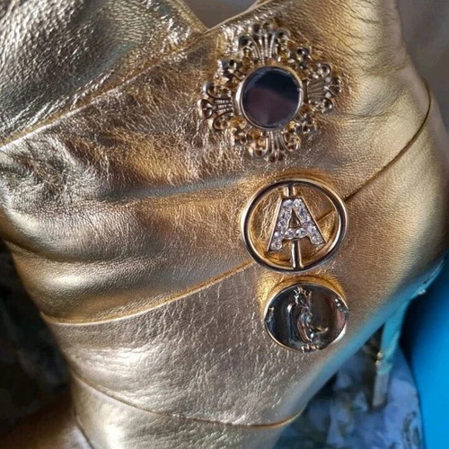 Anna Dello Russo x H and M gold leather booties like new
