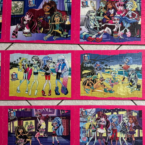 Monster High puzzle set like new, 9 glued on wood