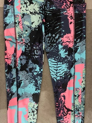 Sportswear women's leggings with pockets like new, multicolor