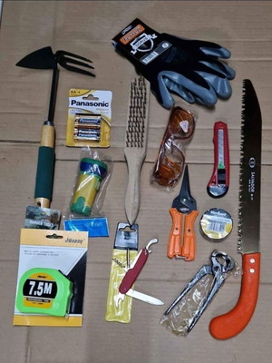 Set of 13 tools new with saw, gloves, multitool and more