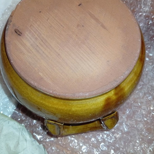 Traditional ceramic clay pot with lid and side handles