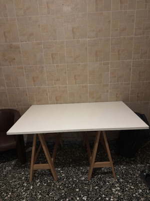 Modern desk table with white surface and wooden trestles, like new