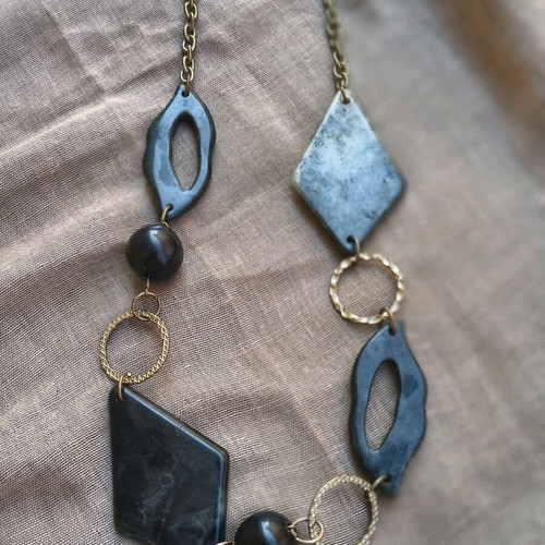 Necklace with black elements like new, modern statement jewelry