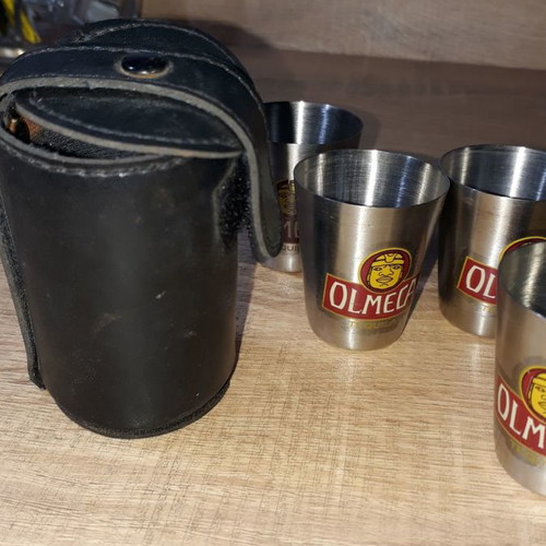Olmeca leather case and four used shot glasses