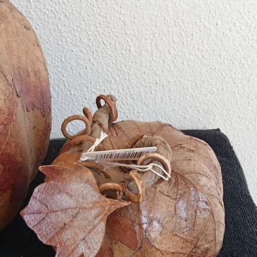 Vintage decorative set of two pieces made of pressed paper and leaves
