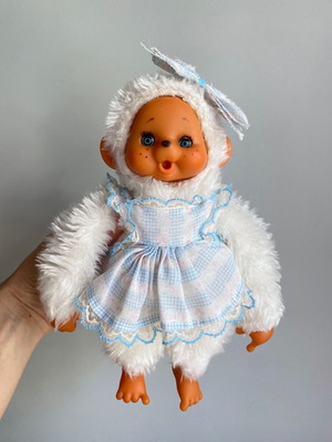 El Greco vintage white monkey plush toy in dress