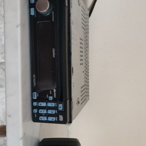 Clarion BD359RMP car radio CD player with wiring harness, mount and faceplate case