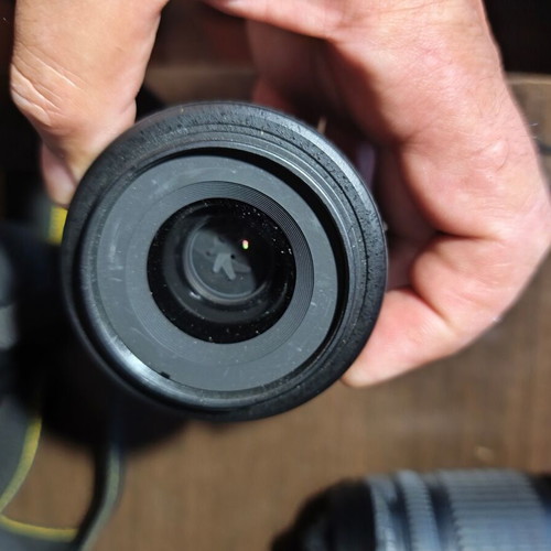 Nikon D5200 DSLR with Nikkor 35mm f/1.8G lens and accessories