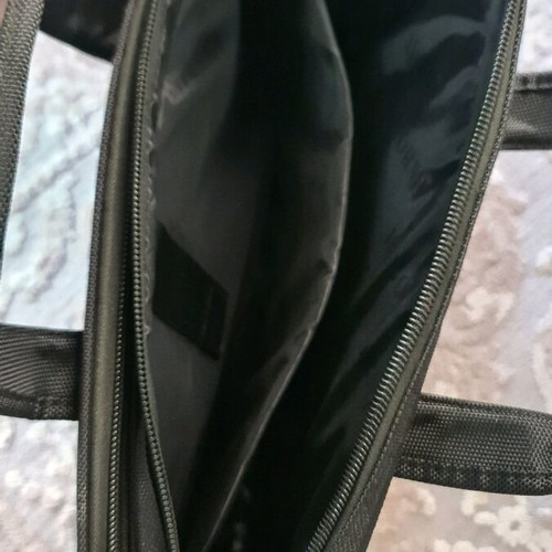 Ormi briefcase like new, hand and shoulder, black-brown