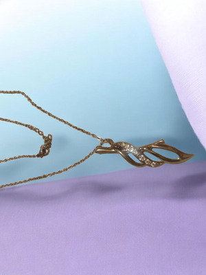 Handmade necklace with gold stainless steel chain and gold leaf pendant