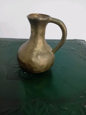 Small brass pitcher used, solid