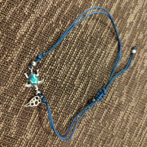 Bracelet new with turtle and feather charms, blue turquoise