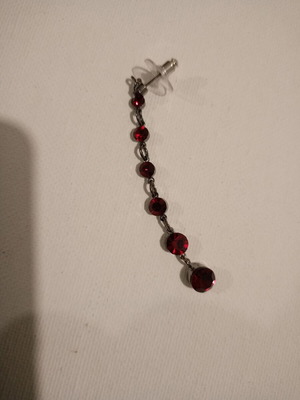 Women's earring like new with red stones single, silver