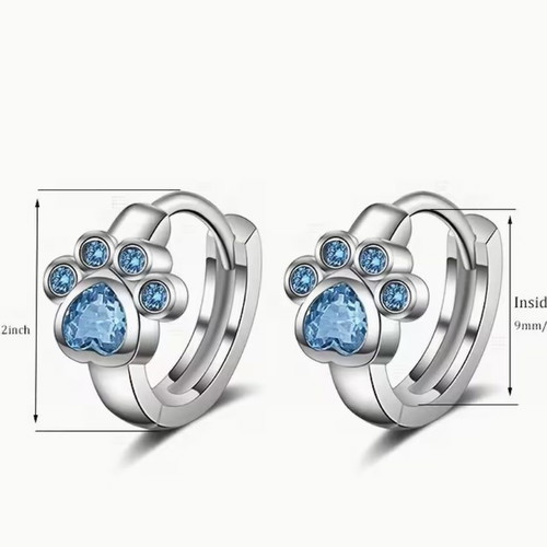 Paw print earrings new with blue stones