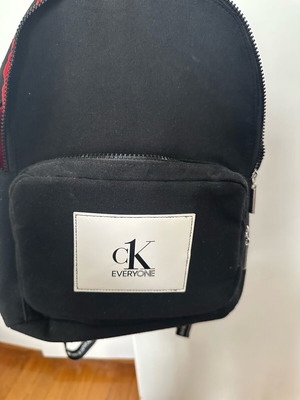 Ck One Backpack new, black with red interior