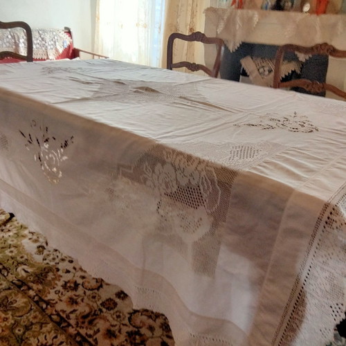 Handmade tablecloth used with knitted corners, lace and cutwork