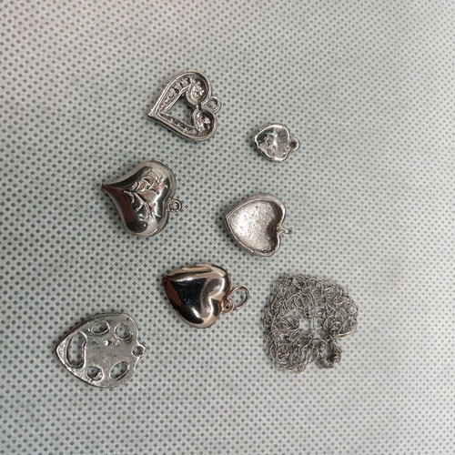 Metal heart-shaped elements like new, pack of seven for crafts