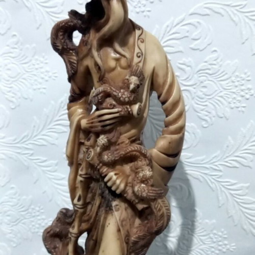 Decorative tabletop statue of Asian man like new