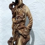 Decorative tabletop statue of Asian man like new