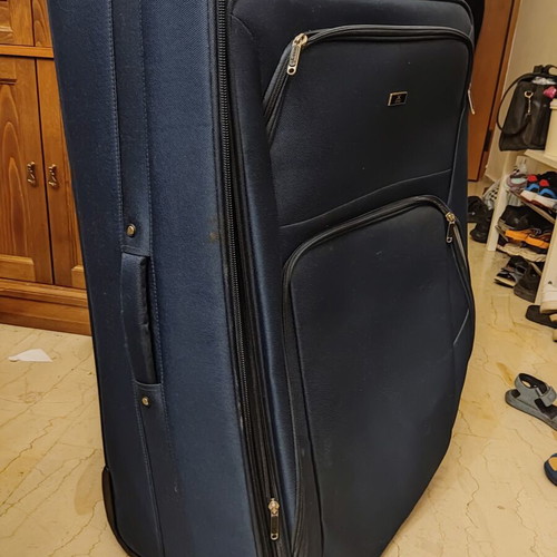 Large suitcase like new, blue with wheels