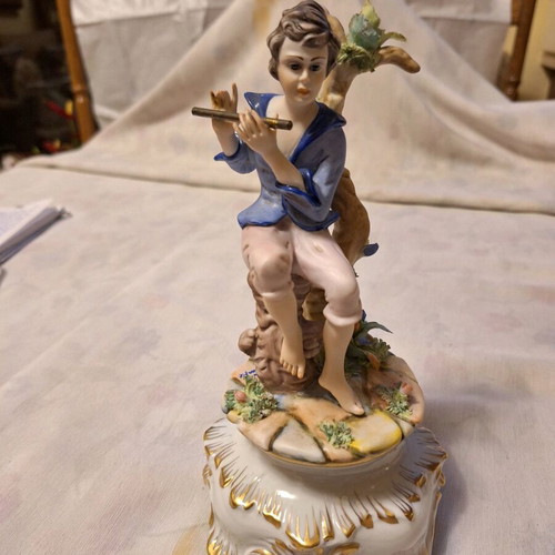 Capodimonte porcelain boy with flute like new with artist signature