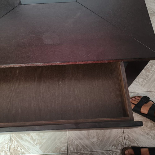 Wooden coffee table used with drawer and glass detail