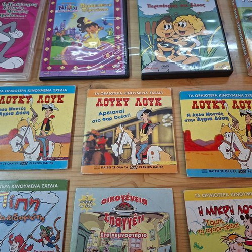 Collection of 10 children's animated DVDs with cases, dubbed