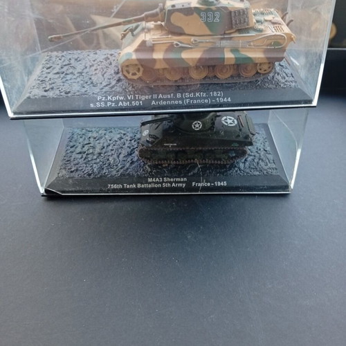 Collectible 1:72 scale tank models used with protective cases