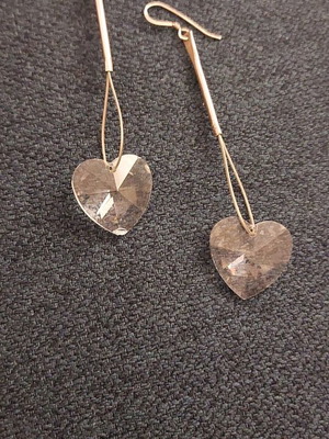 Earrings with transparent crystal hearts like new