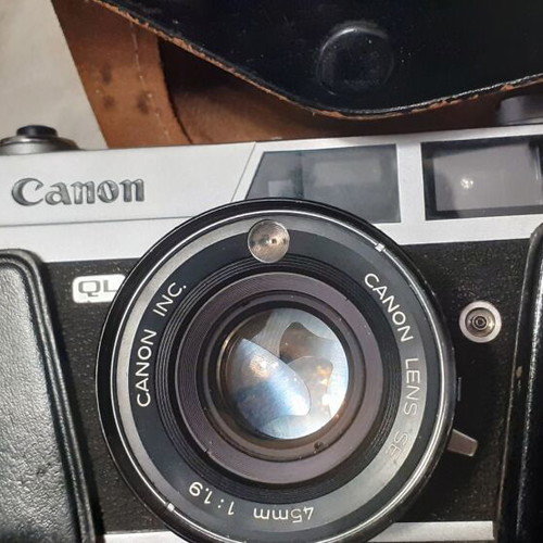 Canon Canonet QL19 camera used with flash and extra lens